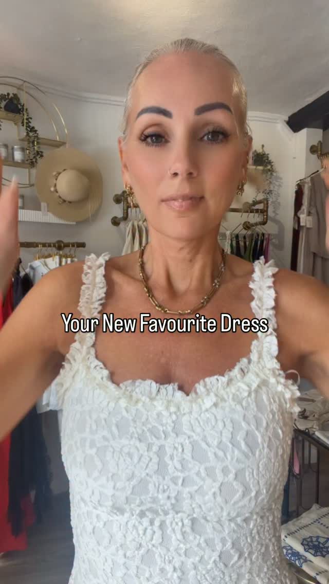 White lace occasion dress worn in the boutique